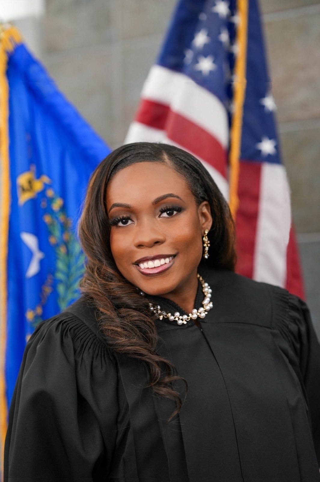 Honorable Krystal Bradford, official Las Vegas judicial headshot with American and Nevada flags