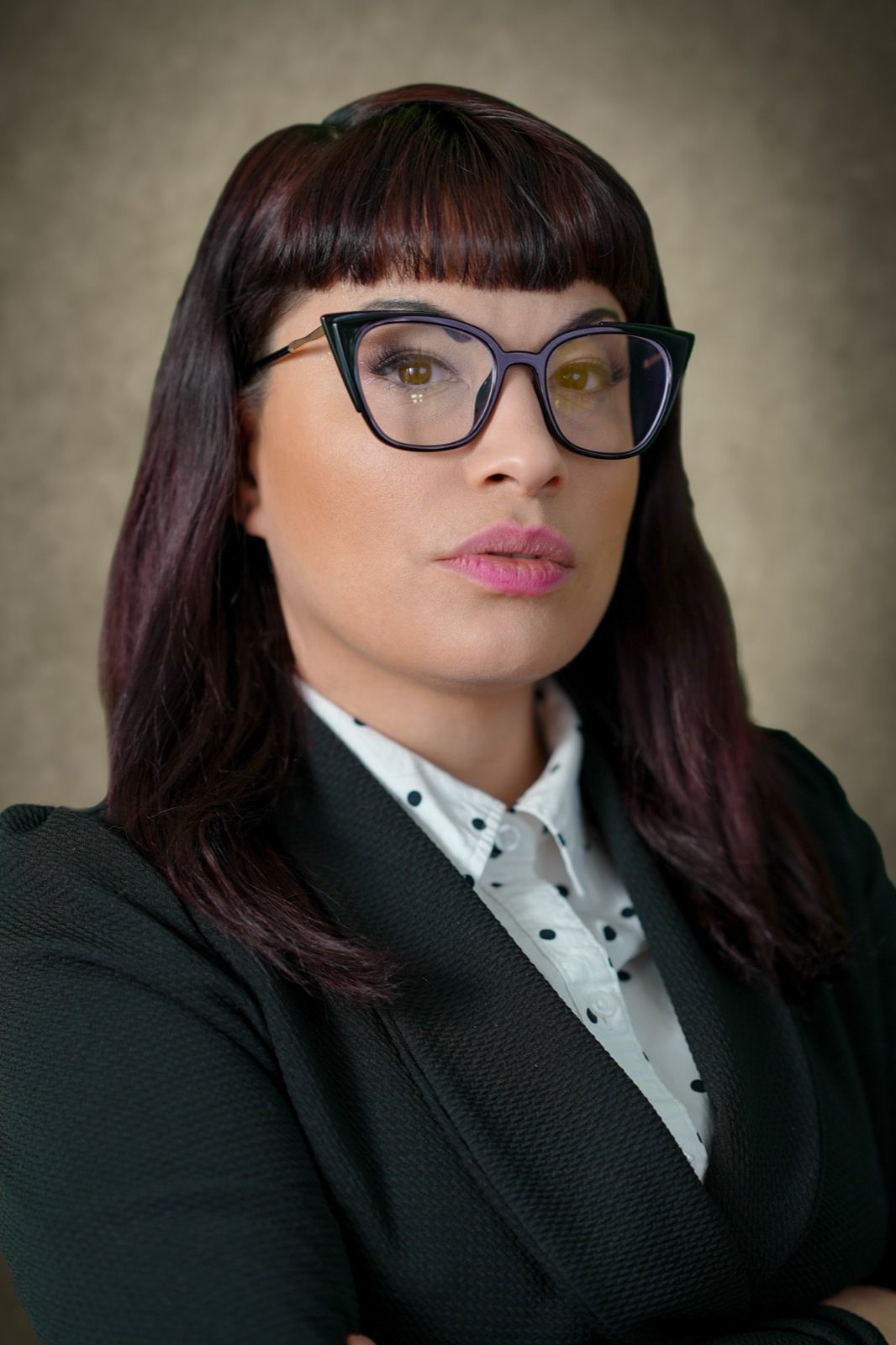 Tia, Las Vegas actress headshot with a textured backdrop